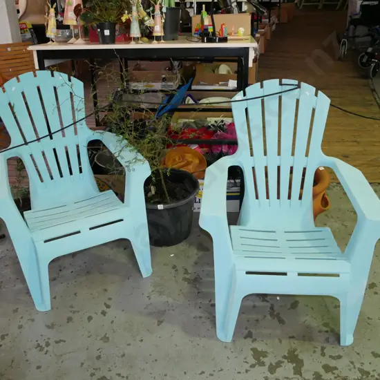 2x plastic Cape Cod style chairs