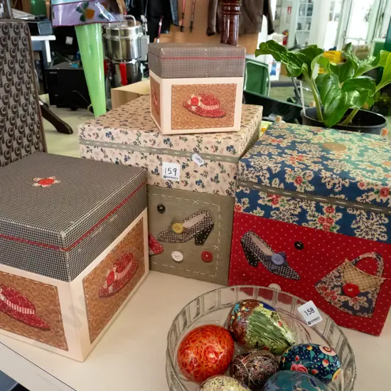 4x graduated decorative lidded storage boxes