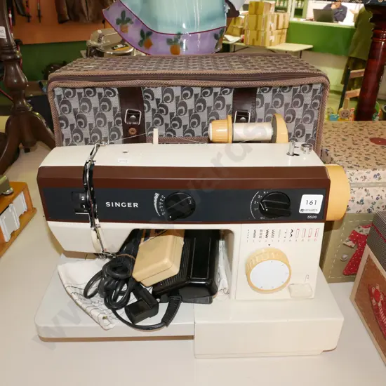 Singer sewing machine with soft carry case