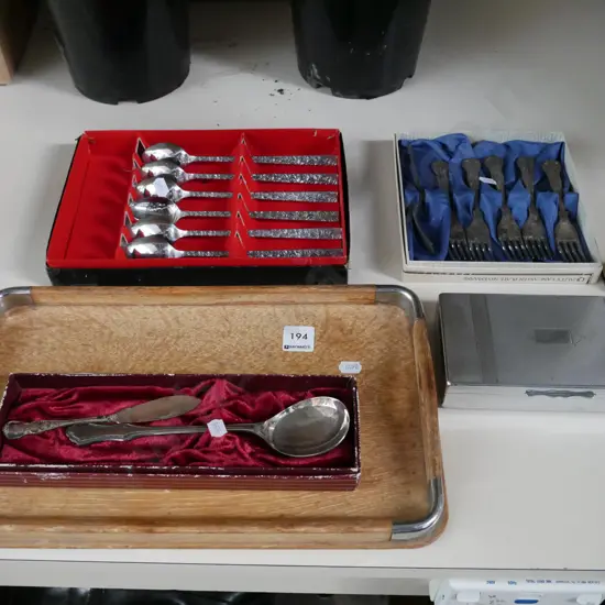 stainless steel cutlery, cigarette case, wood and chrome tray