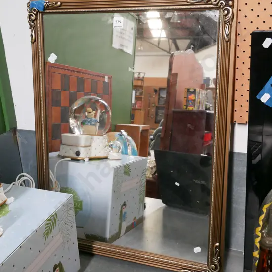 ornate framed wall mirror