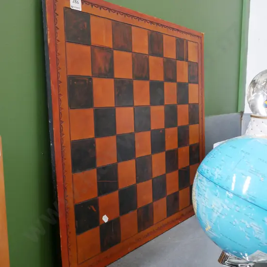 carved and stained leather top chess board