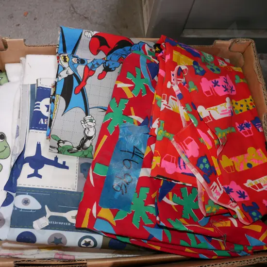 box of fabric pieces