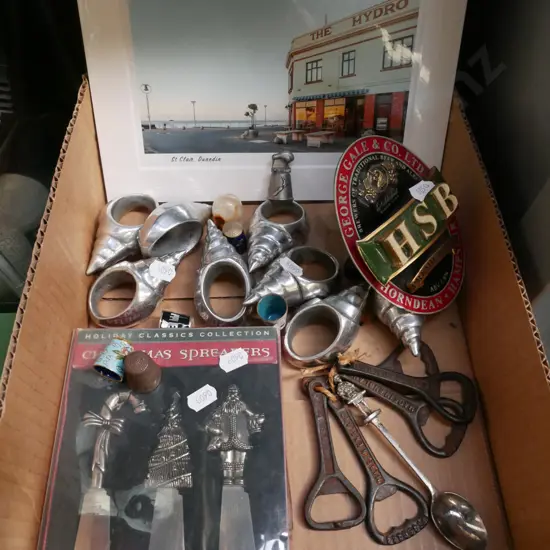 box; napkin rings, St Clair photo, bottle openers etc