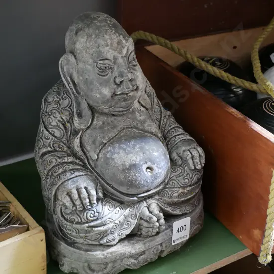 concrete buddha figurine