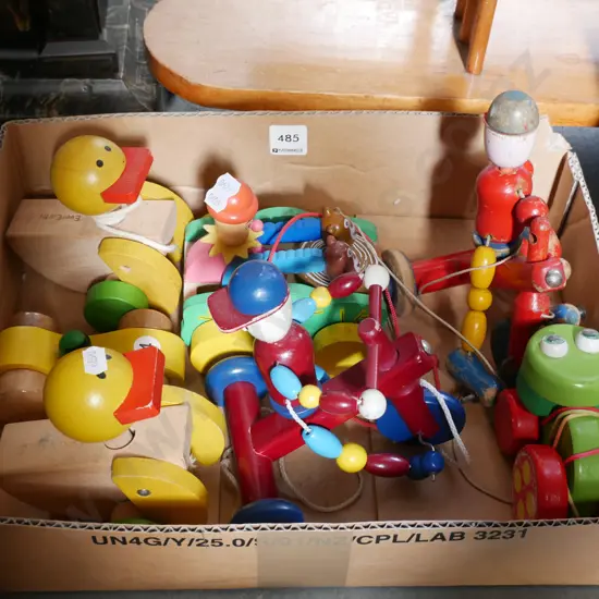 box of children's pull along toys