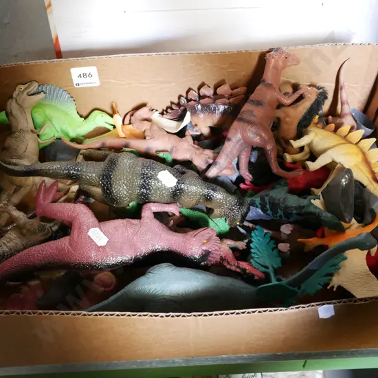 box of plastic dinosaurs
