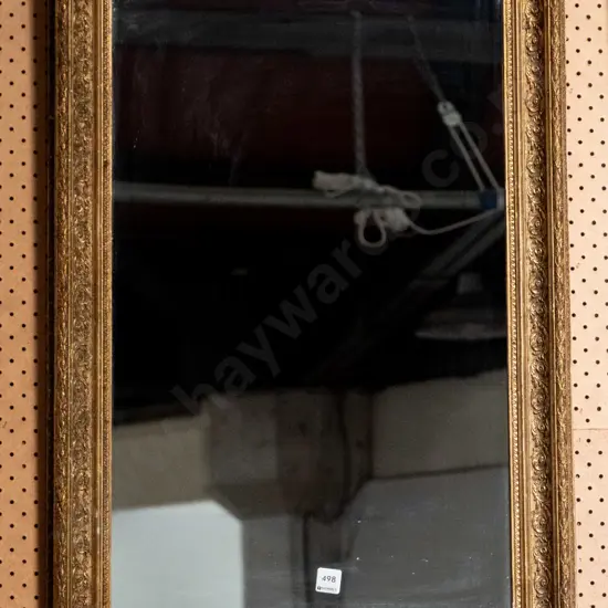 ornate gilt framed mirror