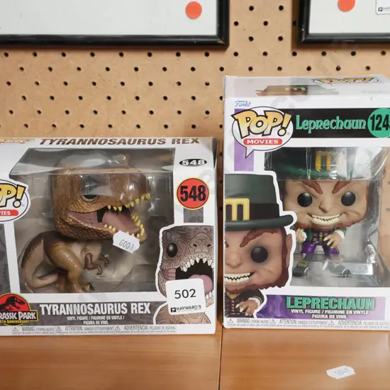 2x Pop Games figurines; T-Rex, Leprechaun