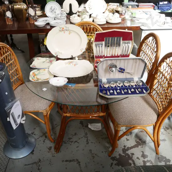 bamboo and glass top pedestal tabel with 4 matching bamboo and upholstered chairs