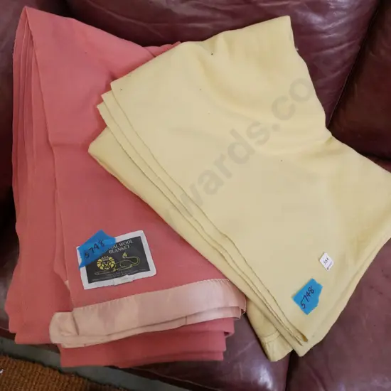 yellow and pink woollen blankets