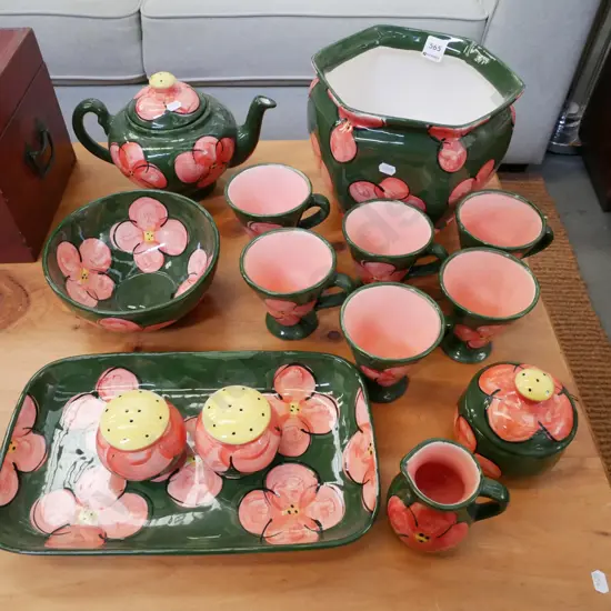 assortment of Christine Harris pottery items; cups, bowls etc