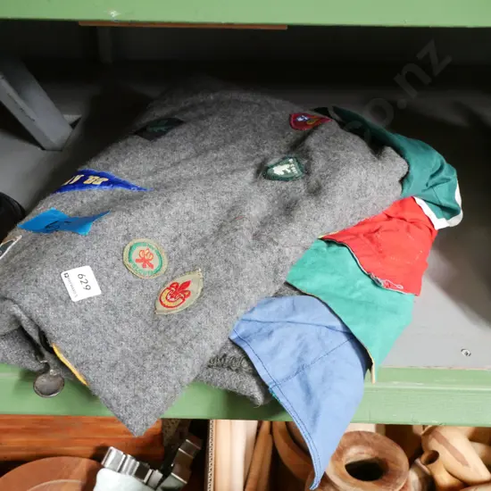 gray woollen blanket with attached Scouts badges