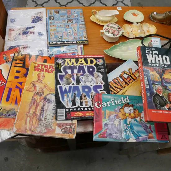 Garfield comic, Dr. Who book, Mad magazine, Footrot Flats, etc.
