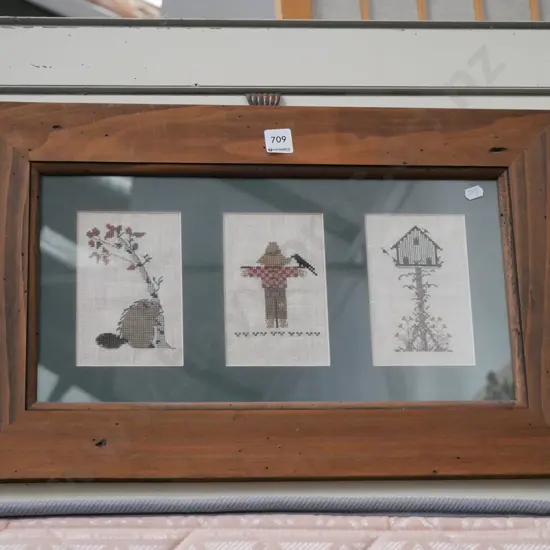 framed needlework triptych