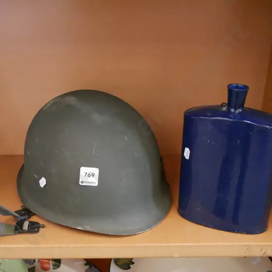 blue metal canteen, military helmet