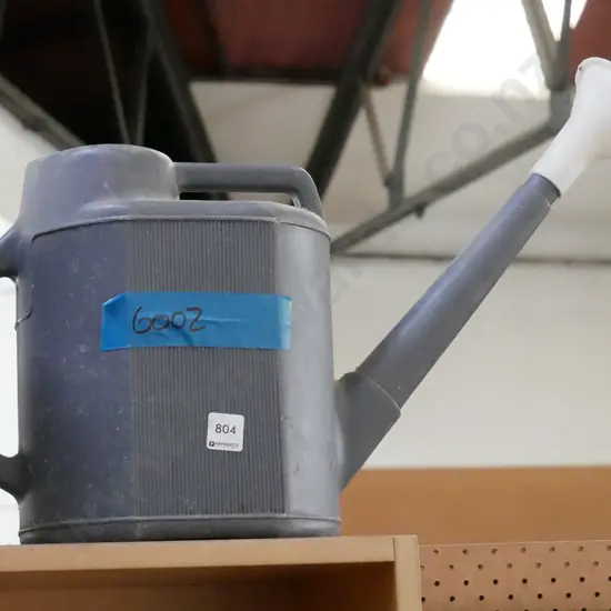 plastic watering can