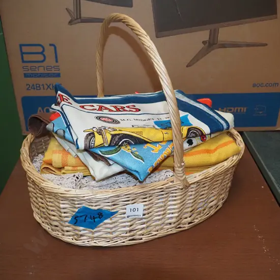 cane basket, tablecloths, tea towels etc