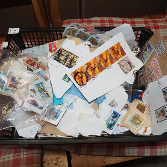 plastic tray of stamps