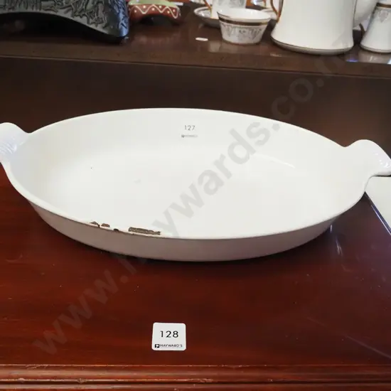 cast iron and enamel Le Creuset dish - some damage