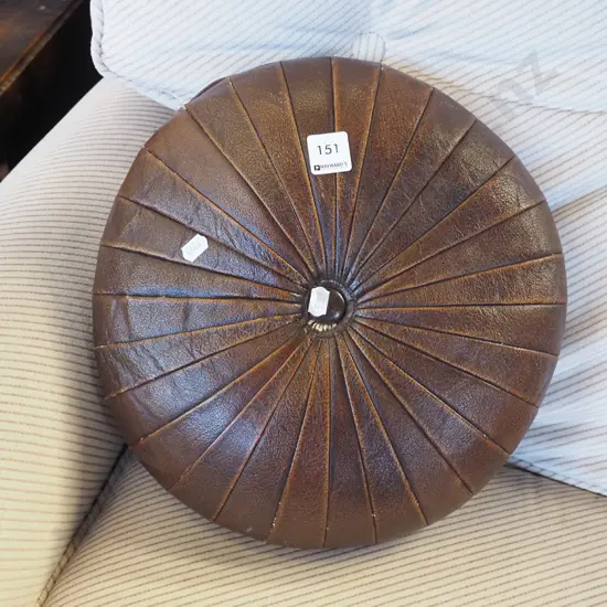 small brown leather cushion