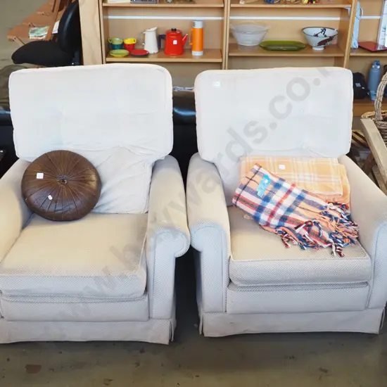 2x cream upholstered deep buttoned armchairs