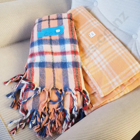orange checked blanket, travel rug