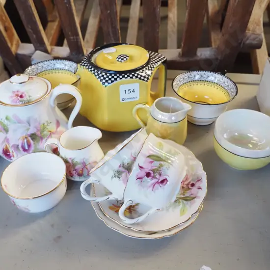 teapots, cups, saucers, creamers, sugars