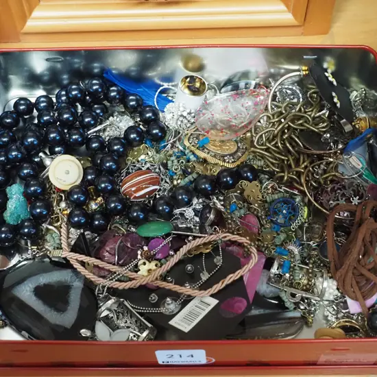 tin of costume jewellery