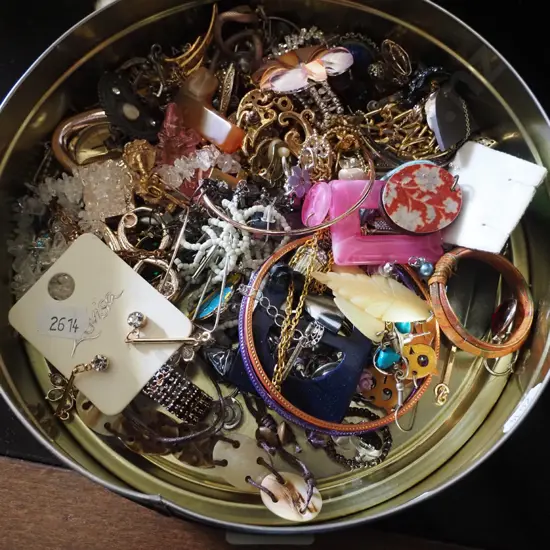 tin of costume jewellery