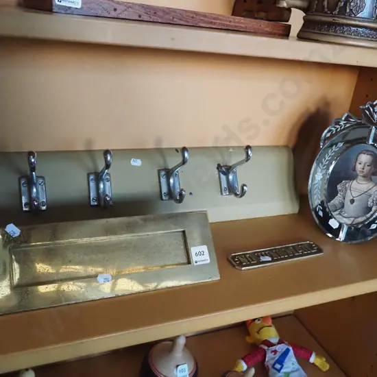 mirror photo frame, coat hooks, brass letter slot etc