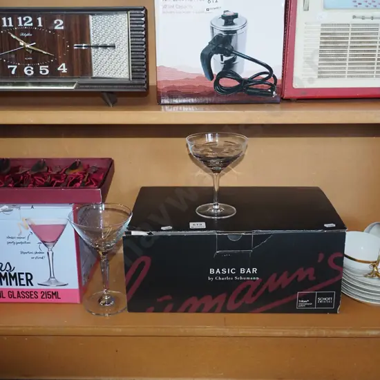 cased cutlery, cups, saucers, cocktail and parfait glasses