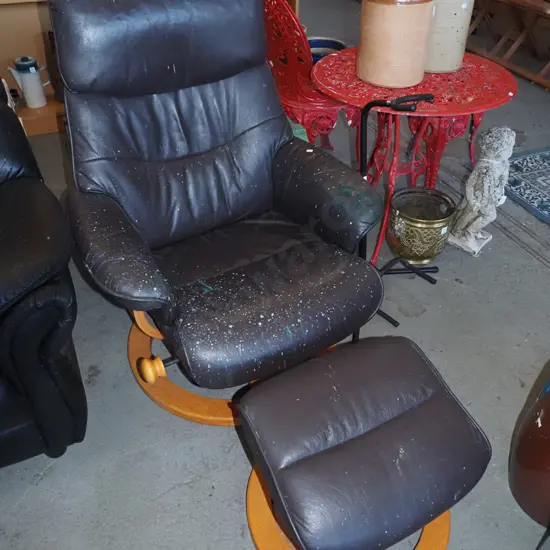 brown vinyl rocker recliner chair with footstool - covered in paint splatters