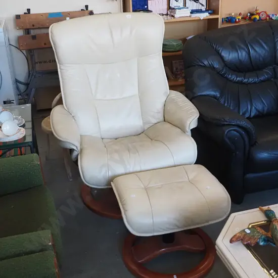 cream leather upholstered rocker reclining chair with footstool - leather needs a clean