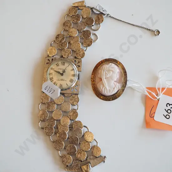 wristwatch, cameo brooch