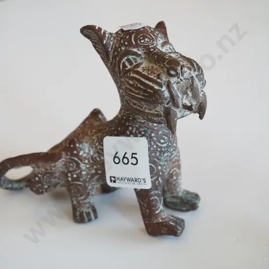 small cast metal dog figurine