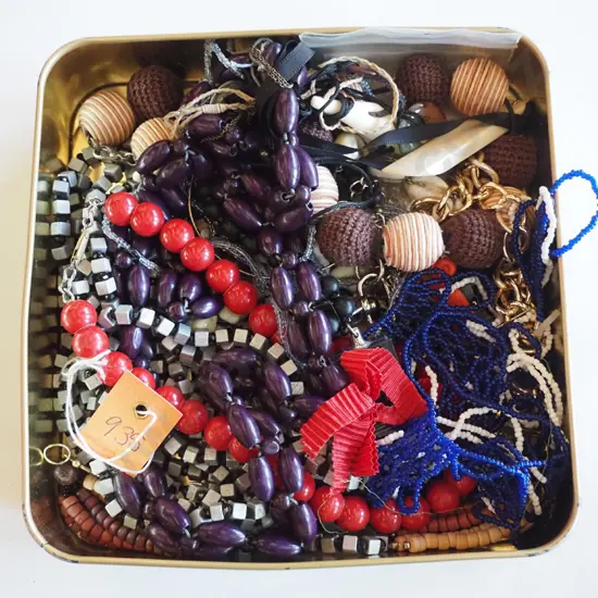 tin of costume jewellery