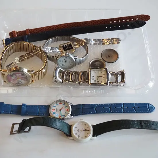 tray of wristwatches
