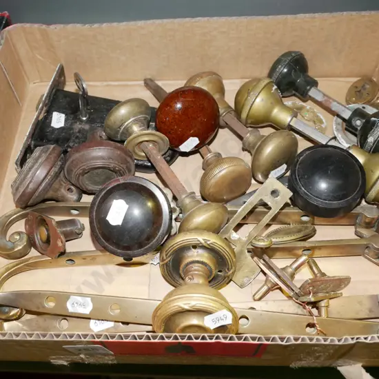 box of vintage window and door hardware