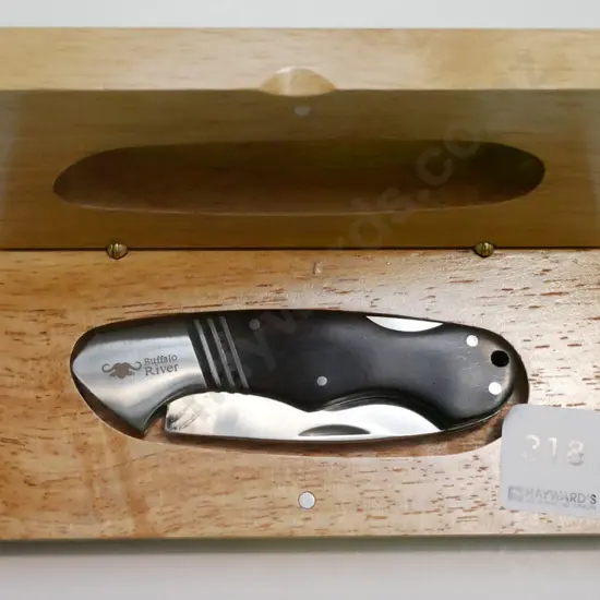 wood cased Black Bear knife