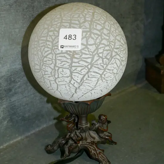 reproduction cast metal based table lamp 