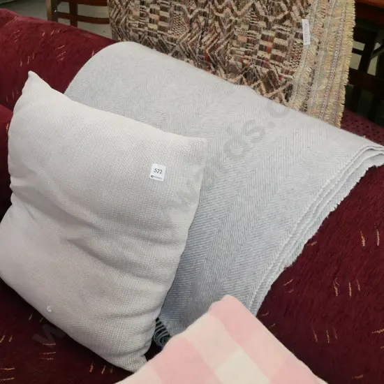 grey woollen blanket, matching cushion