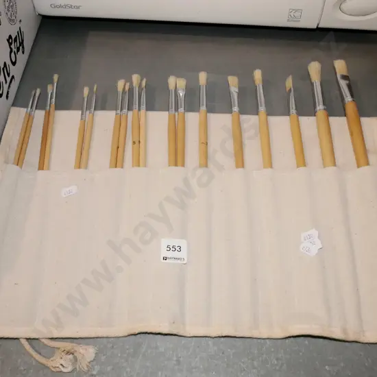 artist's brushes in canvas carry case