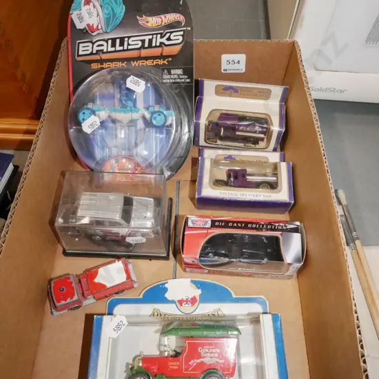 box of model vehicles