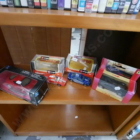 shelf of model vehicles