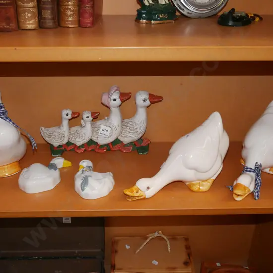 cast iron and ceramic duck figurines