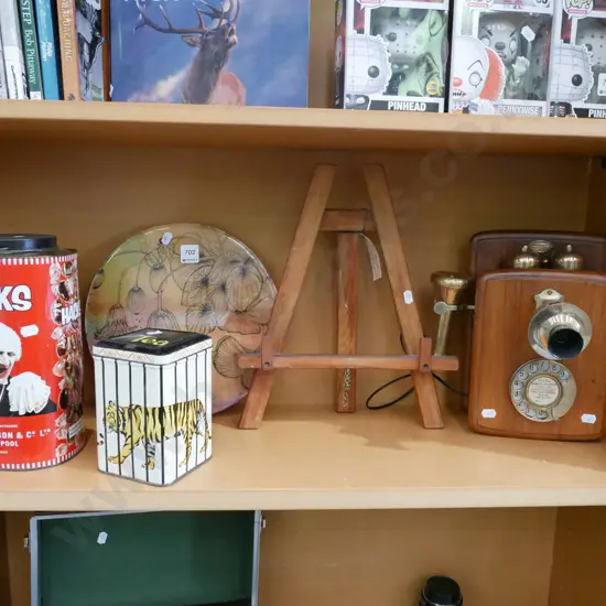 shelf; easel, reproduction dial telephone, tins etc
