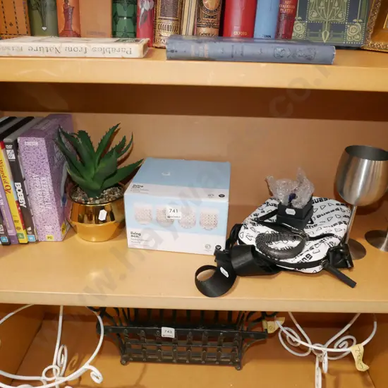 shelf; glasses, DVDs, faux plants etc