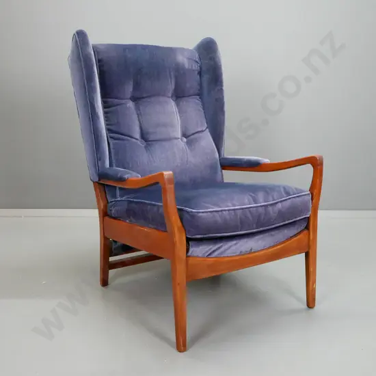 retro mahogany blue velvet upholstered wingback lounge chair - has screws added through side of front legs to front rail