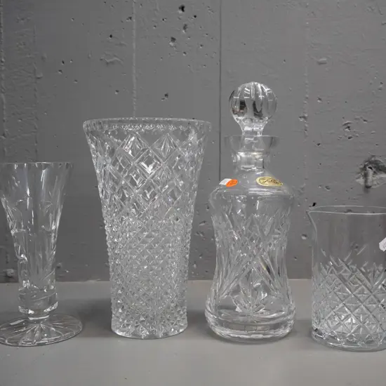 4 pieces of crystal - stoppered decanter with Julia Poland label H-310, 2 vases and a beaker